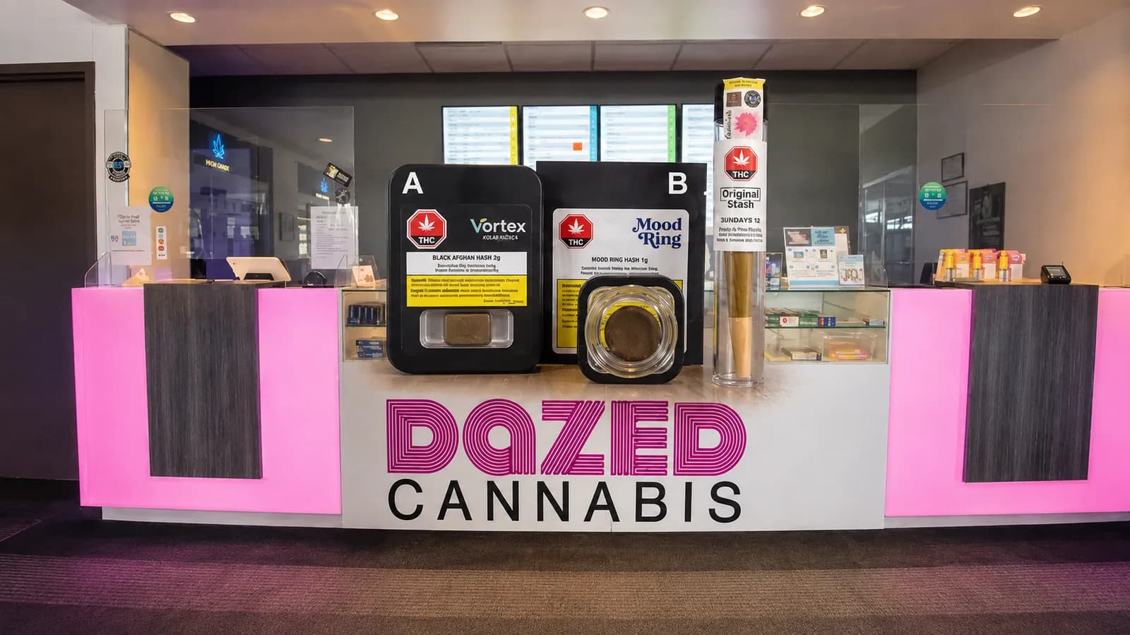 Dazed service counter with products arranged for staff-assisted requests