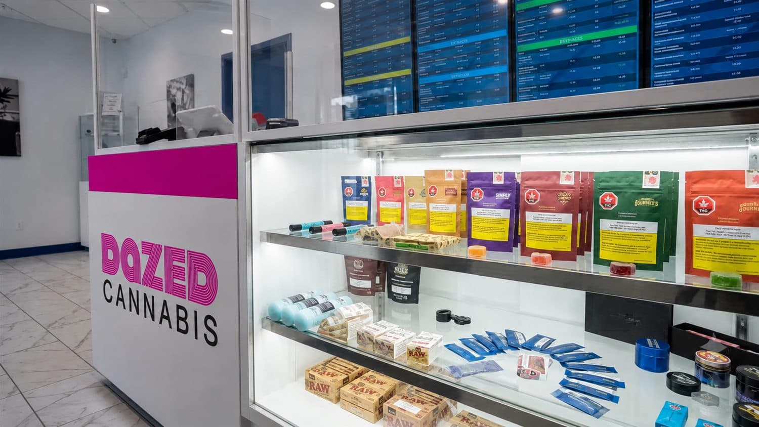 Dazed Cannabis display counter with products arranged in illuminated cases